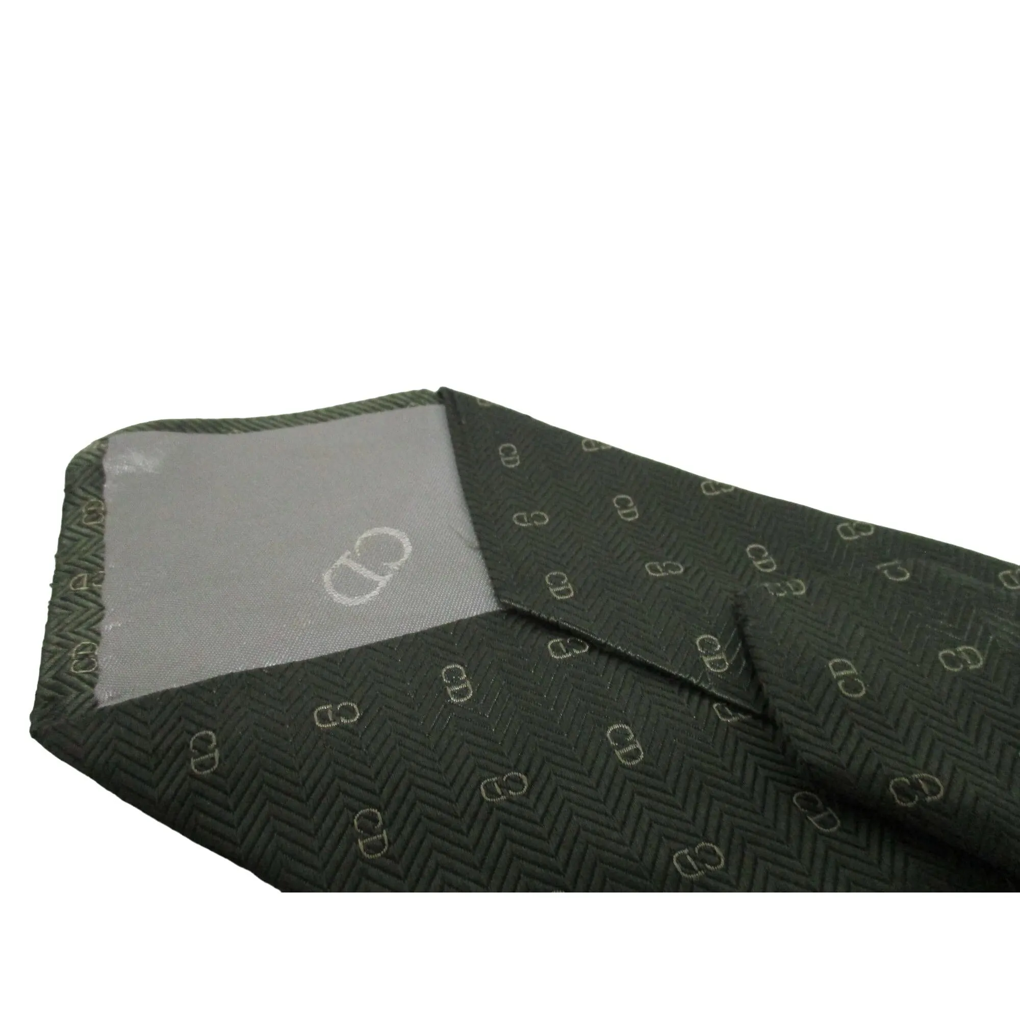Vintage Christian Dior tie made of 100% textured, olive green silk with a logo print in shades of tan
