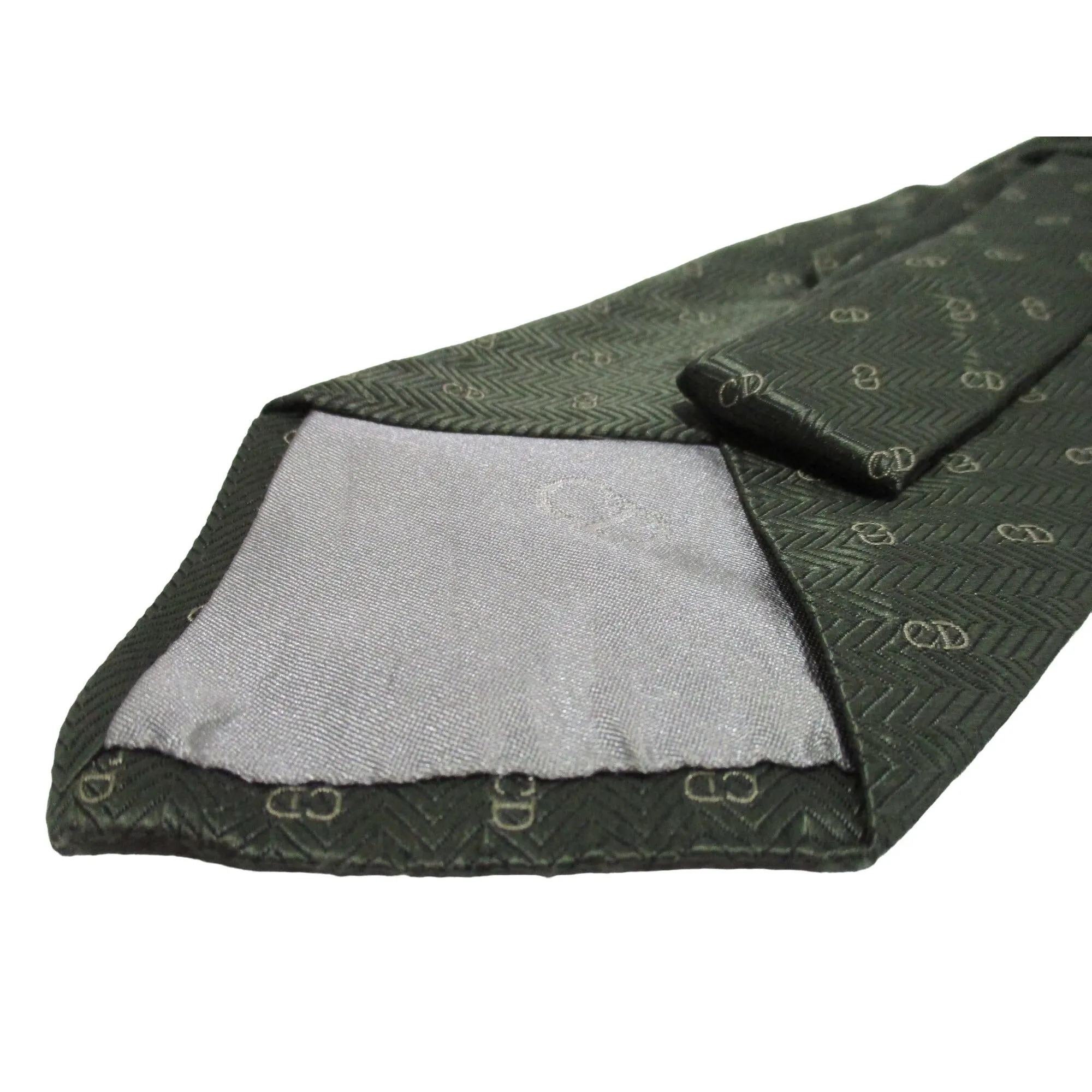Vintage Christian Dior tie made of 100% textured, olive green silk with a logo print in shades of tan